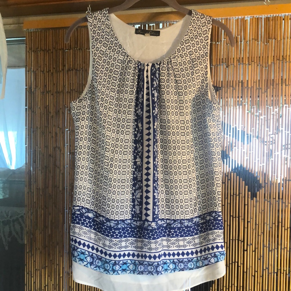 Ladies size medium sleeveless blouse from Rose and olive